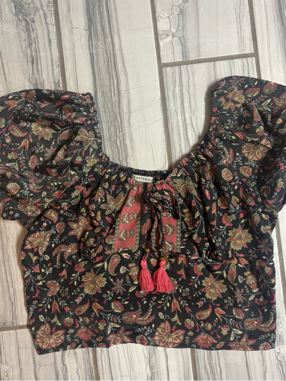 EARTHBOUND Black Floral Crop Top with Red Tassels